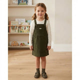 Conjunto Infantil com Camisa de Poá e Vestido Pinafore em Veludo Verde